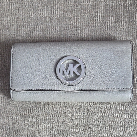 Michael Kors Handbags - Michael Kors Silver Leather Wallet